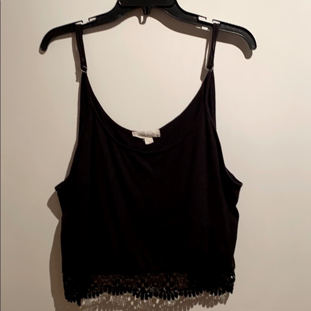 Cute cropped tank with embroidery along bottom